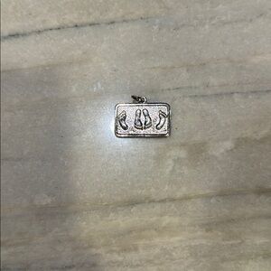 Sterling silver pendant / charm with footprints
